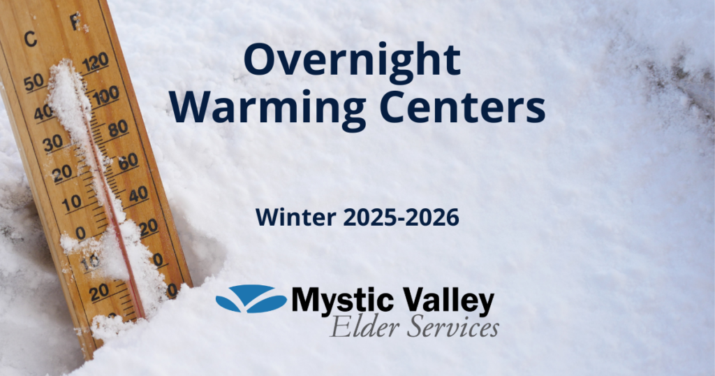 Snowy background with a wooden thermometer stuck in the ground. Text overlaid says Overnight Warming Centers, Winter 2025-2026, and toward the bottom is the MVES logo.